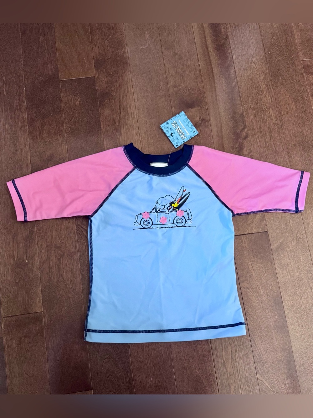 Brand new Hanna Andersson Peanuts Blue and Pink Snoppy Car Kids Rashguard sz 6/7